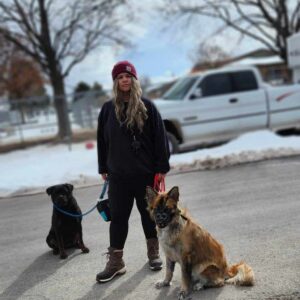 Sam outdoors with dogs